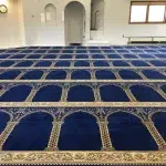 Self Leveling 77 A blue prayer rug with intricate golden patterns