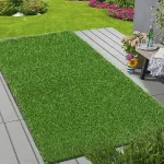 Carpet Dubai Drafted 107 Artificial grass carpet sample being held to show texture and thickness.