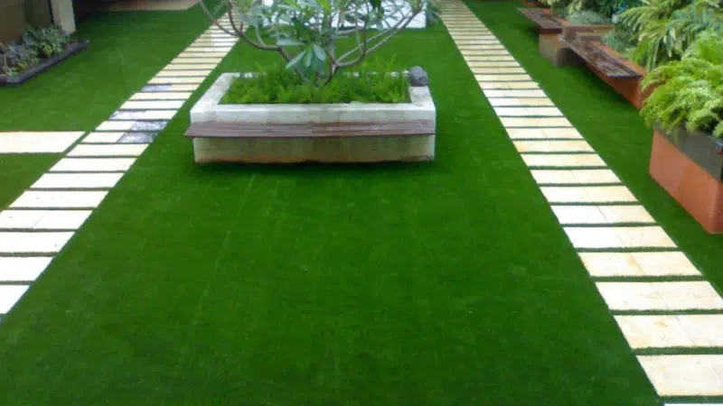 Artificial Grass 21 Close-up of lush green artificial grass carpet with realistic texture.