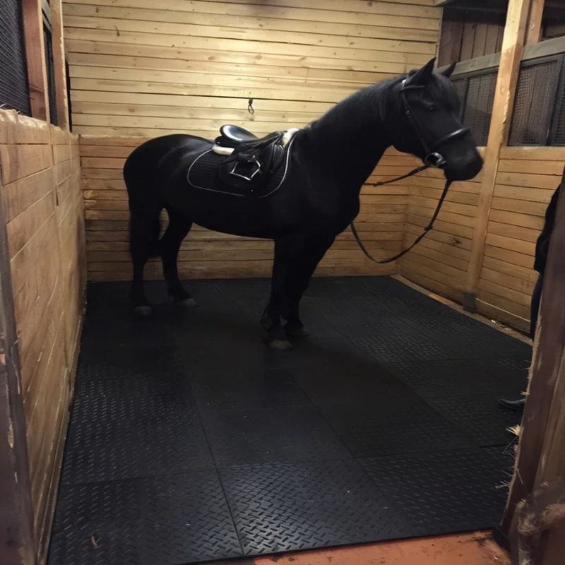 black rubber stall mats