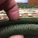 A Stitching Show of Green Color Mosque Carpet
