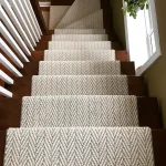 Elegant stair carpet installation in a luxury Dubai villa.