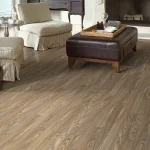Golden maple solid wood flooring in a brightly lit hallway.