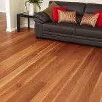 Honey-toned solid wood flooring for living space.