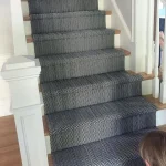 Modern staircase with custom carpet design in Dubai.