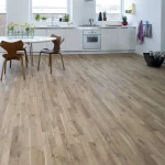 Rich mahogany solid wood flooring with elegant furniture in a classic interior.