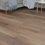 A close up view of Cappuccino Oak Click LVT Flooring