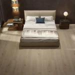 Modern Bedroom with light oak SPC flooring.