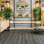 SPC flooring with realistic stone texture in a hallway.