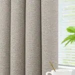 A texture view of beige color curtains in Dubai