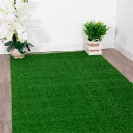 Bright green artificial turf carpet placed on your place in Dubai