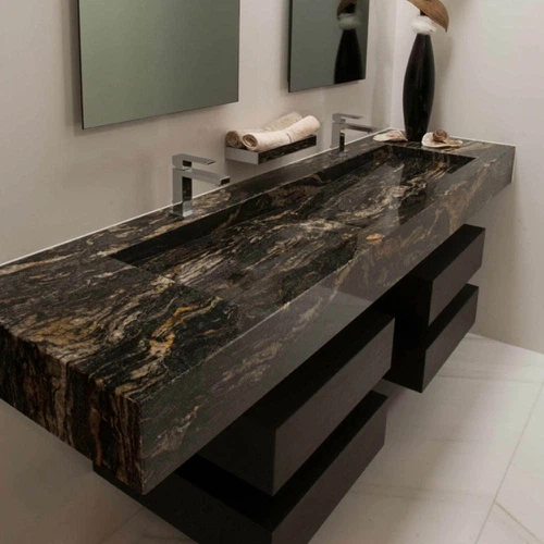 luxury-dark-marble-double-vanity-worktop-with-integrated-basins-and-chrome-taps Image 7 Description: Anti-slip stone effect bathroom floor tiles with freestanding white bath and wooden bath caddy. Alt tag: anti-slip-stone-effect-bathroom-floor-tiles-with-freestanding-white-bath-and-wooden-bath-caddy Image 8 Description: Soft beige Victorian style patterned floor tiles with floral and geometric motifs. Alt tag: soft-beige-victorian-style-patterned-floor-tiles-with-floral-and-geometric-motifs Image 9 Description: Victorian patterned porcelain floor tiles in blue and grey beside a freestanding roll top bath. Alt tag: victorian-patterned-porcelain-floor-tiles-in-blue-and-grey-beside-a-freestanding-roll-top-bath Image 10 Description: Smart bathroom with digital mirror display, touch control panels, and walk-in rainfall shower. Alt tag: smart-bathroom-with-digital-mirror-display-touch-control-panels-and-walk-in-rainfall-shower Image 11 Description: Modern bathroom with vertical LED mirror lights, recessed spotlights, and ceiling ventilation fan. Alt tag: modern-bathroom-with-vertical-led-mirror-lights-recessed-spotlights-and-ceiling-ventilation-fan Image 12 Description: White floating bathroom vanity unit with open organised drawers, inset basin, and chrome tap. Alt tag: white-floating-bathroom-vanity-unit-with-open-organised-drawers-inset-basin-and-chrome-tap Image 13 Description: Bathroom vanity installation with curved grey painted vanity unit, marble worktop, and tall fitted storage cupboards. Alt tag: bathroom-vanity-installation-with-curved-grey-painted-vanity-unit-marble-worktop-and-tall-fitted-storage-cupboards